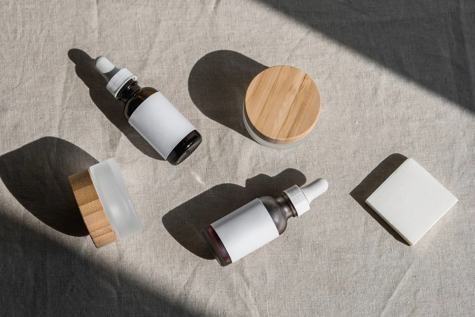 Korean skincare bottles and jars arranged on a light surface